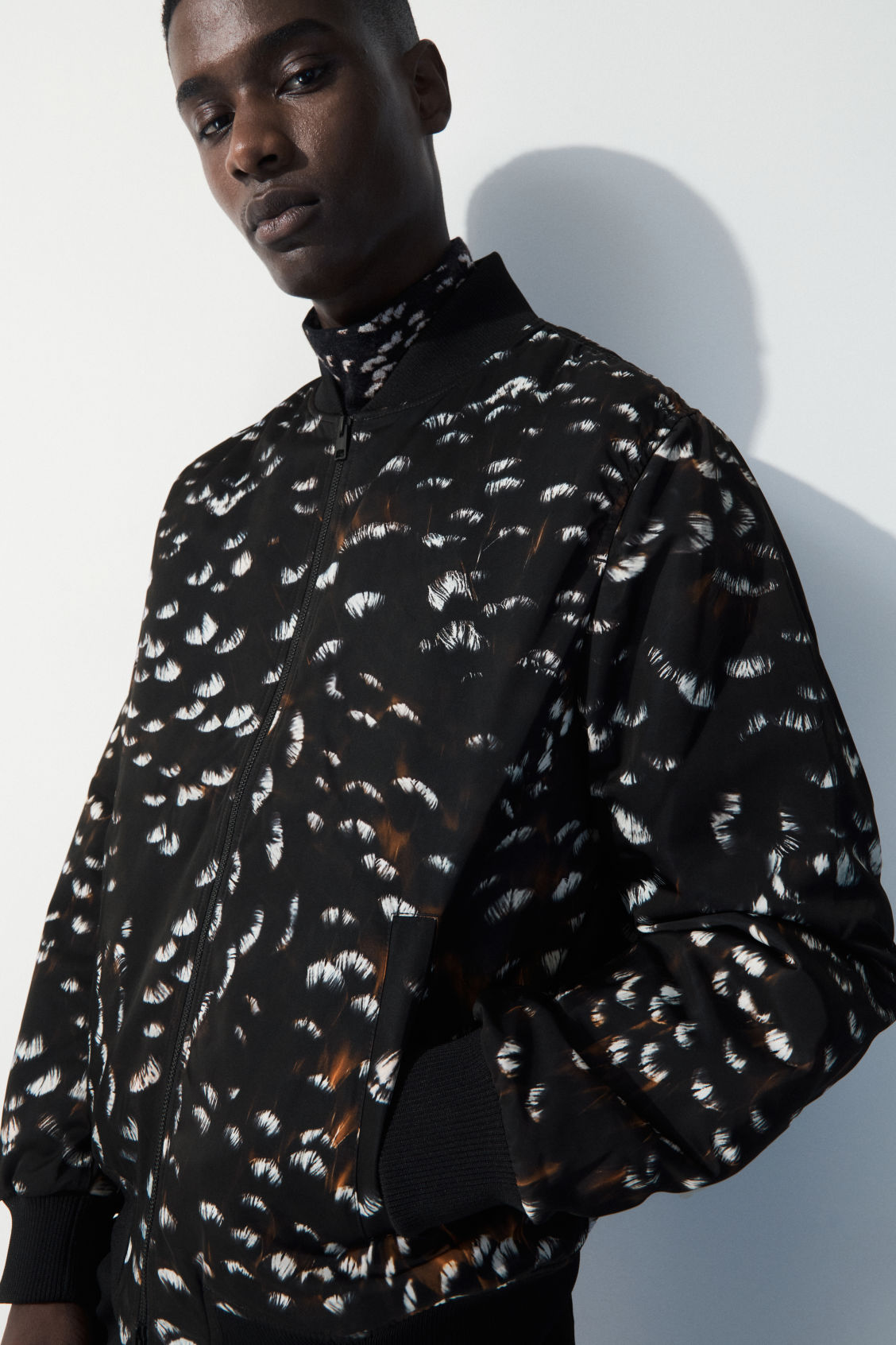 COS THE FEATHER-PRINT BOMBER JACKET