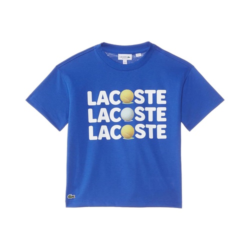 라코스테 Lacoste Kids Short Sleeve Crew Neck Tee Shirt with Large Wording Graphic + Tennis Ball (Little Kid/Toddler/Big Kid)